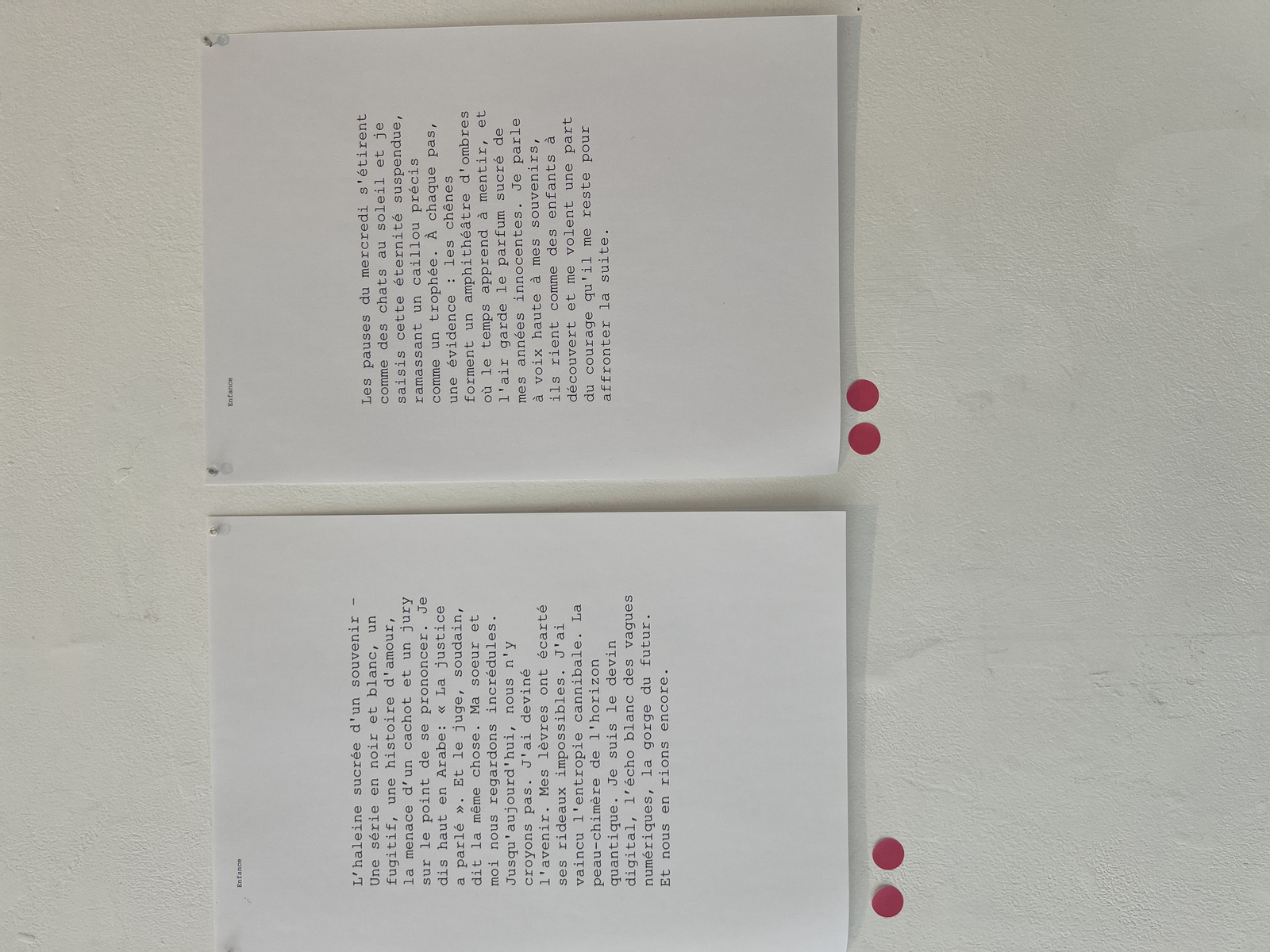 Poems displayed on the wall with visitor votes