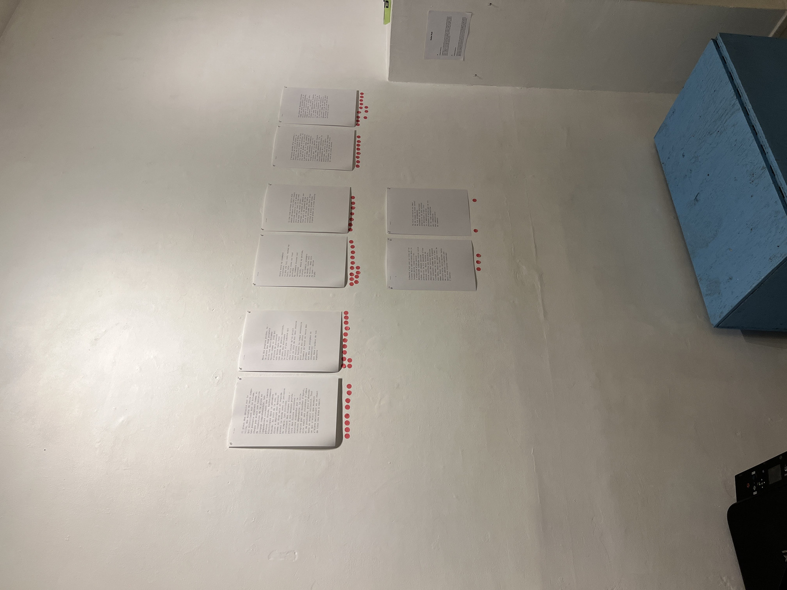 Close-up of handwritten and machine-generated poems