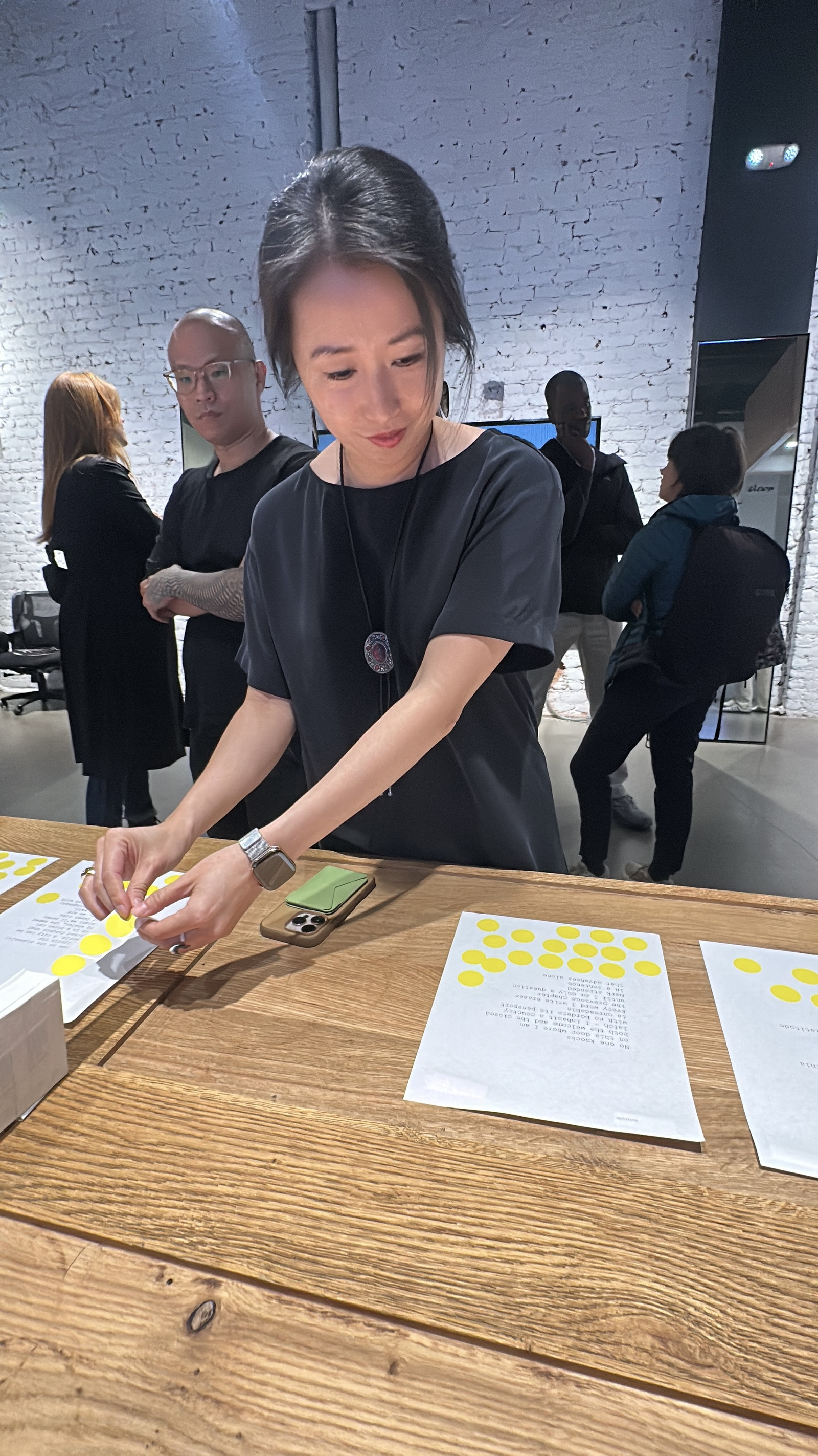 Close-up of voting stickers on poems